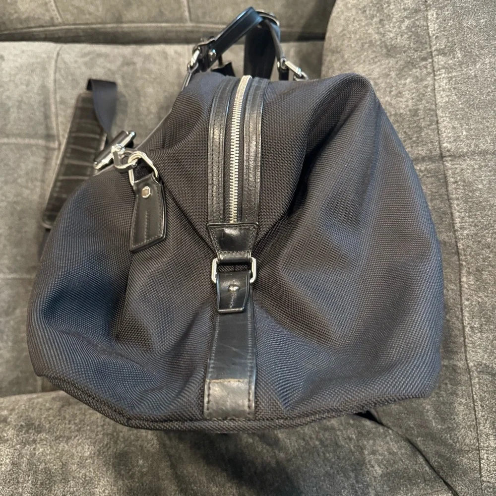 Tumi medium sleek leather